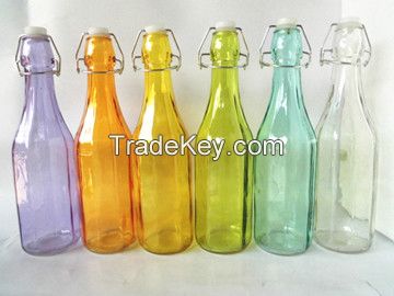 Glass colorful juice bottle with vertical grain