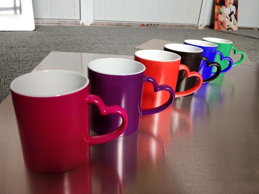 Magic Mugs, Pour hot beverage in it and you'll see another world.