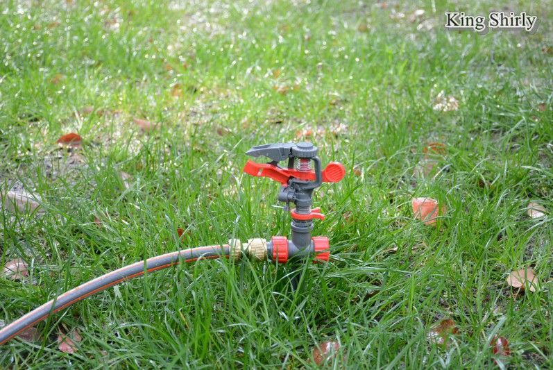 plastic pulsating water sprinkler on spike