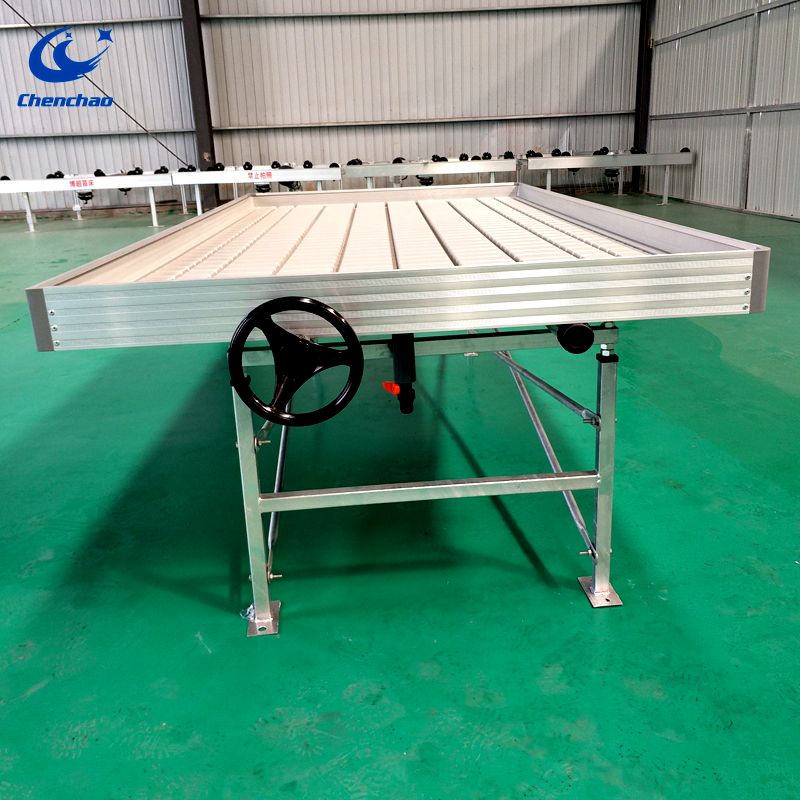 Ebb and flow table greenhouse bench used for seeding