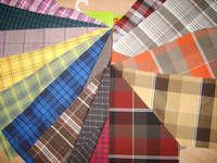 sell poly/viscose (T/R) lady's plaid or stripe fabric