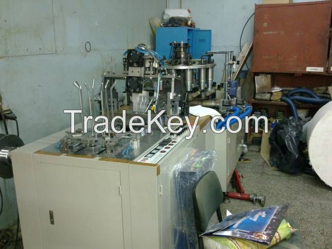 Paper cup making machine and paper cutting machine