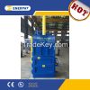 Vertical waste paper baler