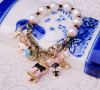 Sell 2011 Hot Sell Many Pendants Pearl Beaded Bracelet & Bangle