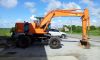 EXCAVATOR  EX100WD , YEARS 1998 WHEELS