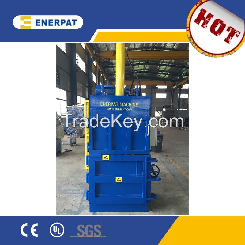 Labor saving carton box bale machine