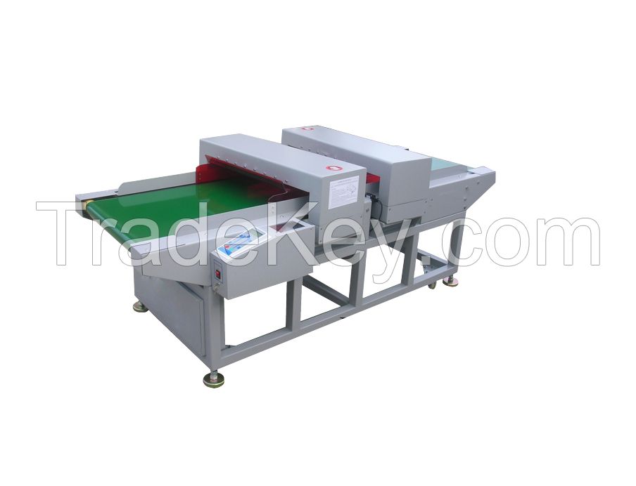 Conveyor belt garment metal detector