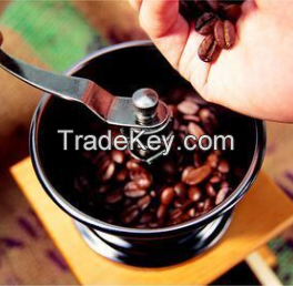 Vintage machine hand grinding coffee beans Manual grinding household