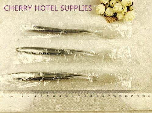 Low cost hotel dental kit