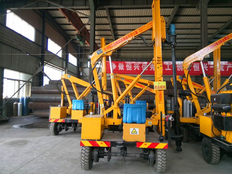 Rock drilling machine pile driver for hard construction site