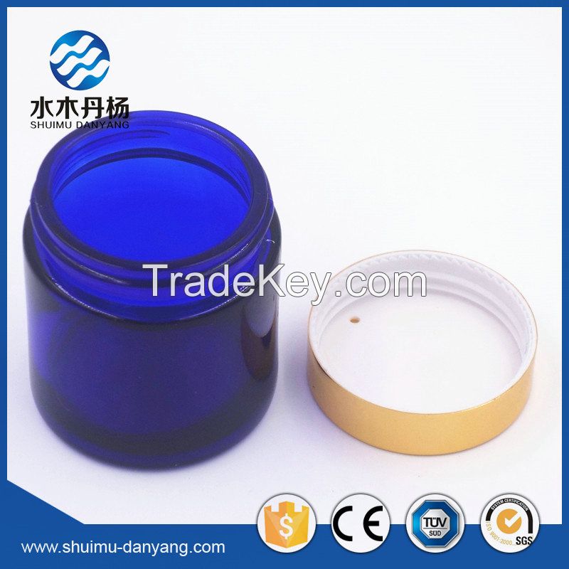 Hot sale 100ml round amber/blue cosmetic glass jar