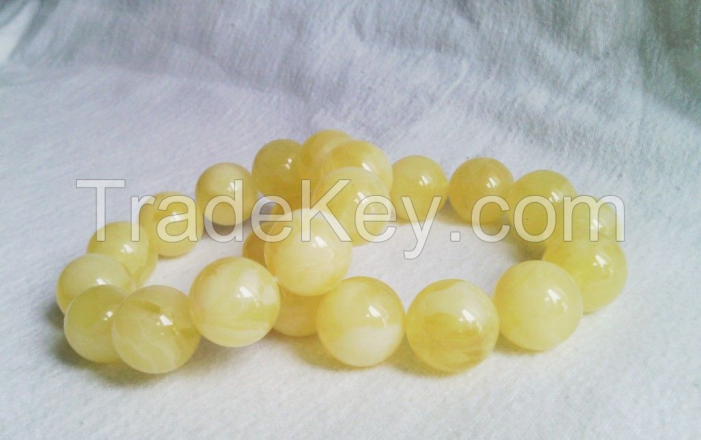 Amber bracelets, white color