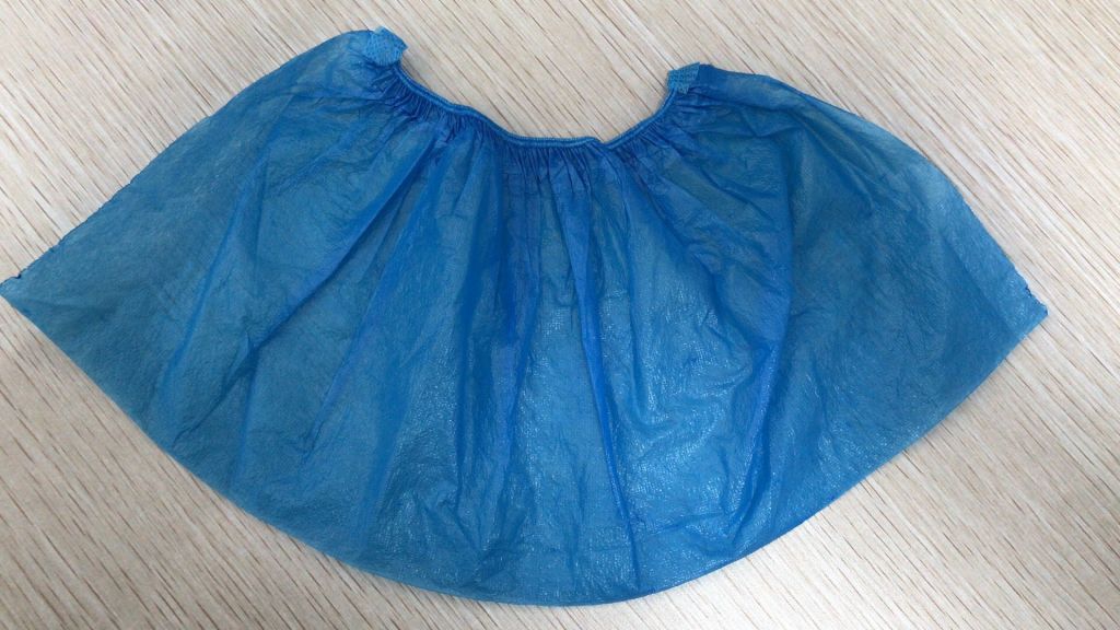 Disposable nonwoven machine shoe cover