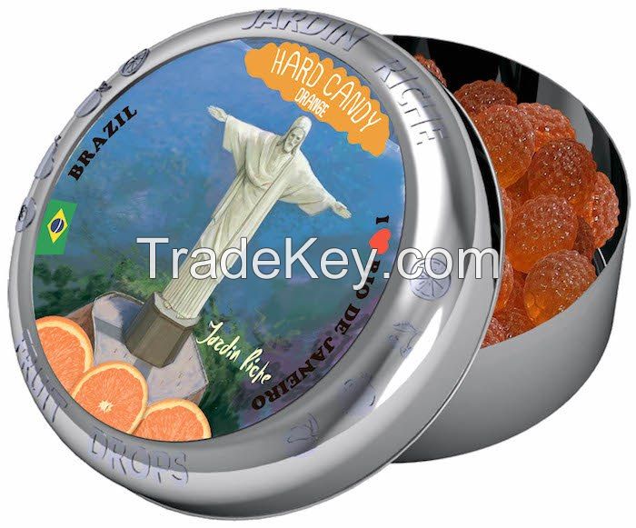 Jardin Riche natural orange flavoured hard candy drops in tin with magnet