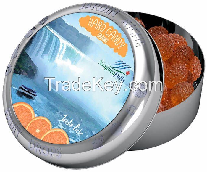 Jardin Riche natural orange flavoured hard candy drops in tin with magnet