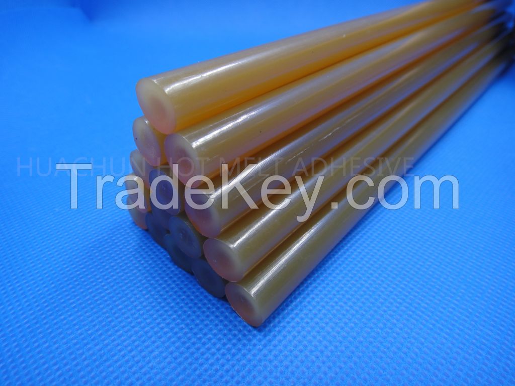 Yellow hot melt glue stick