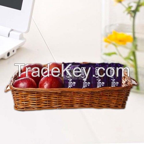 Apples in Basket along with Dairy Milk Chocolates