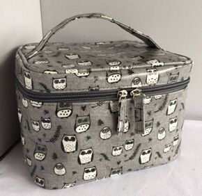 Laminated canvas cosmetic bag with owl pattern