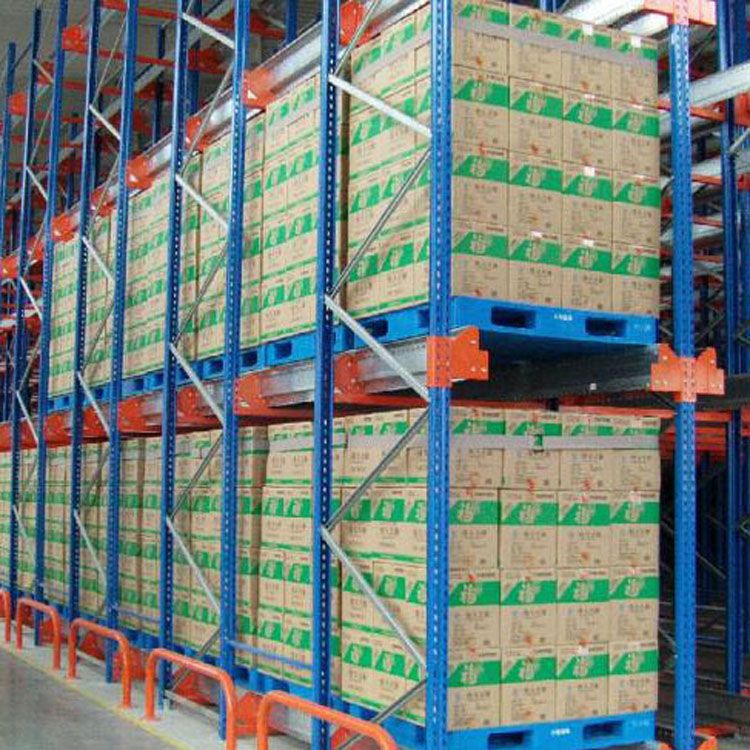 High density warehouse storage drive in pallet racking system