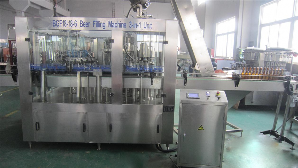 Glass bottle pressure three - in - one filling machine