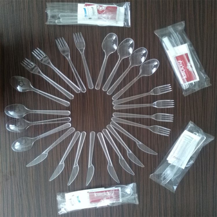 High speed napkin and disposable spoon fork knife packing machine