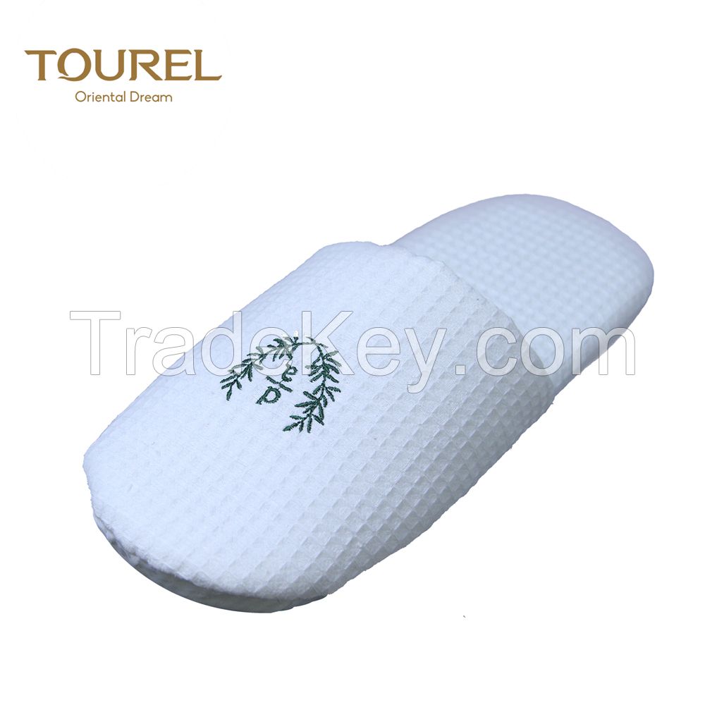 Wholesale disposable coral fleece hotel slippers with customized embroidery