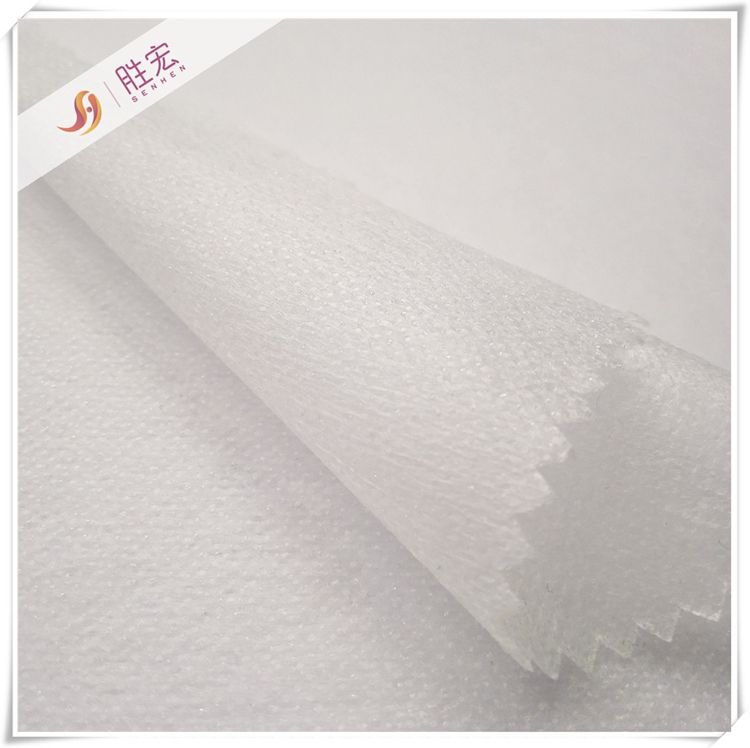 Nonwoven fusible interlining