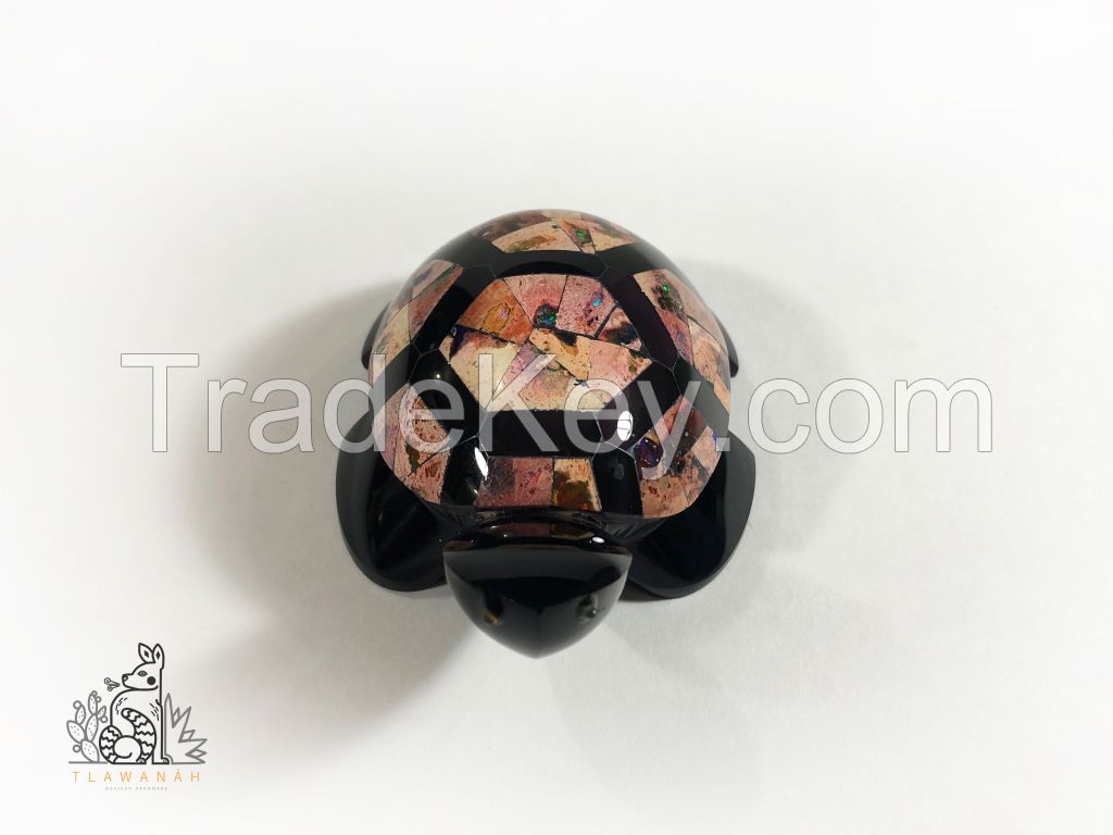 Obsidian turtle with opal inlaid