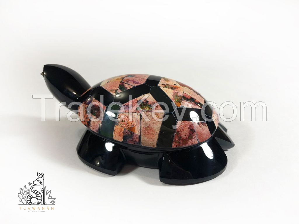 Obsidian turtle with opal inlaid