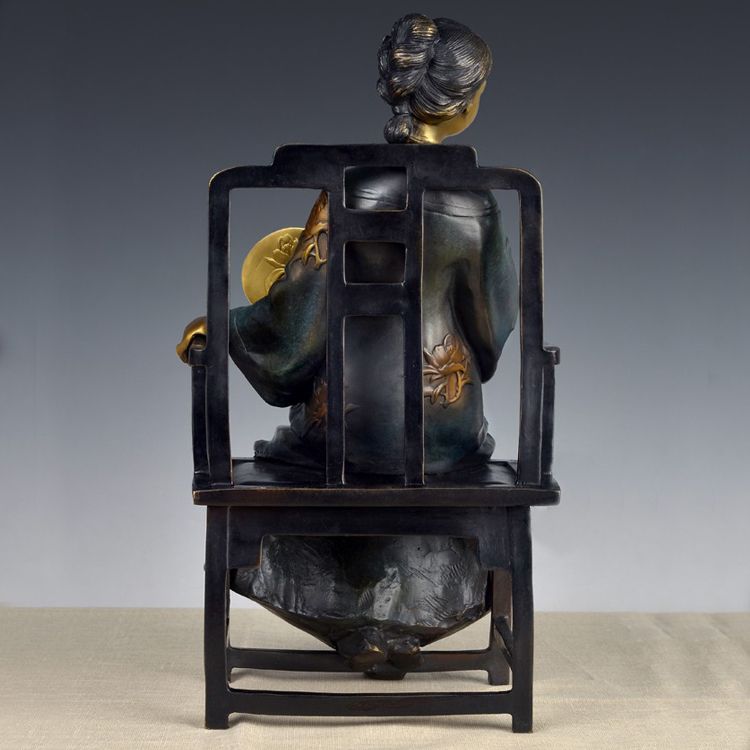 A set of four stylized modern bronze statues of me, a bronze statue of a Chinese woman,