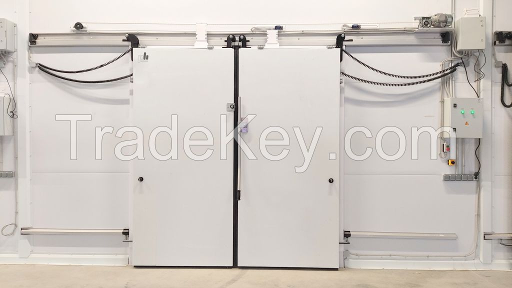 Sliding double leaf door