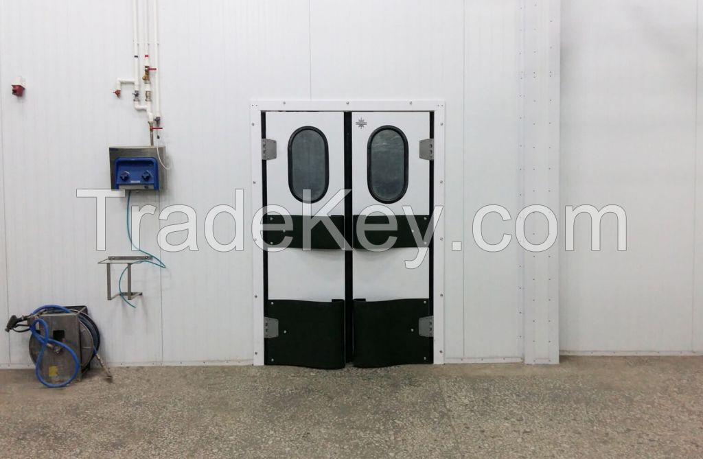 Traffic swinging double leaf door