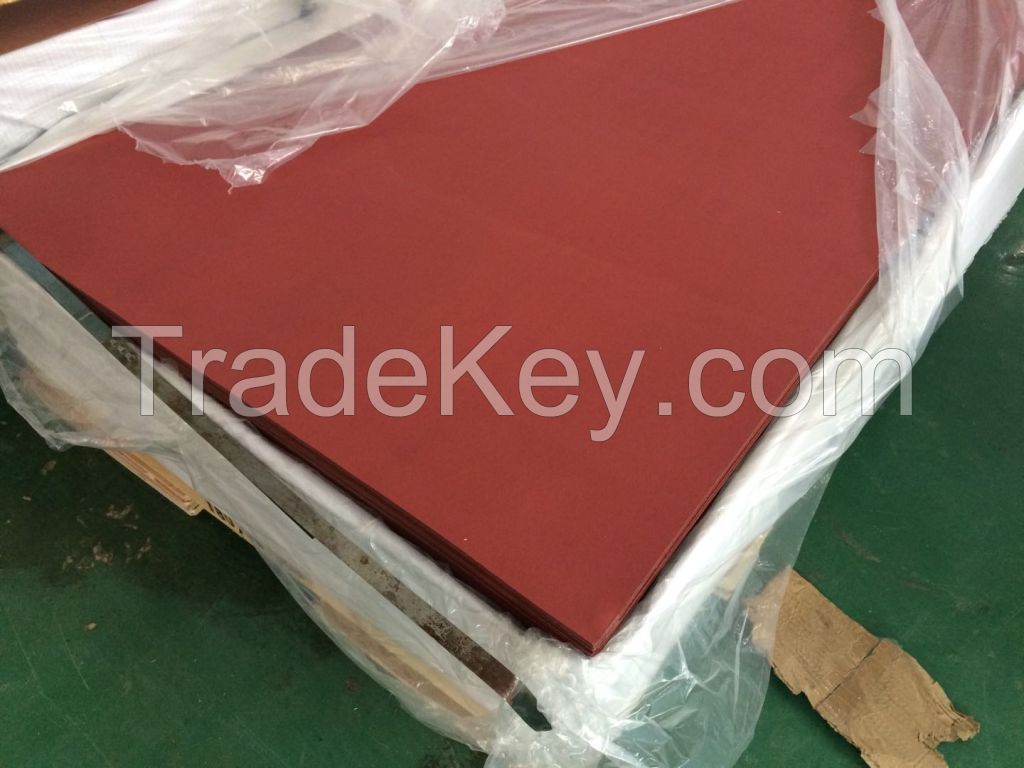 Red electrical insulating paper or paperboard