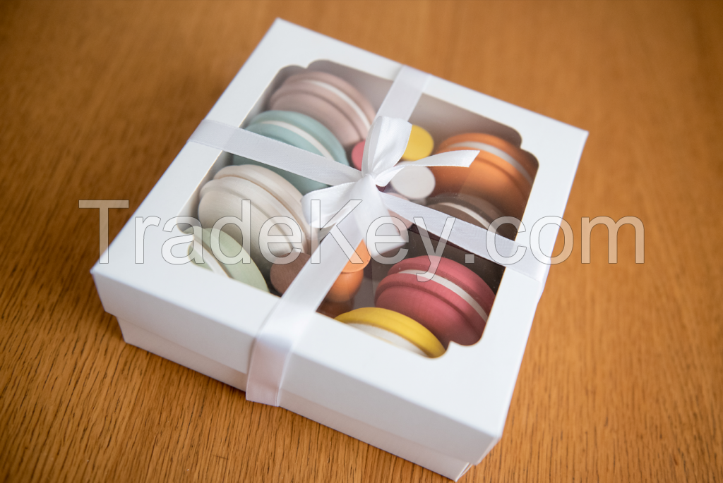 Wooden set of toy cookies macaron and candles