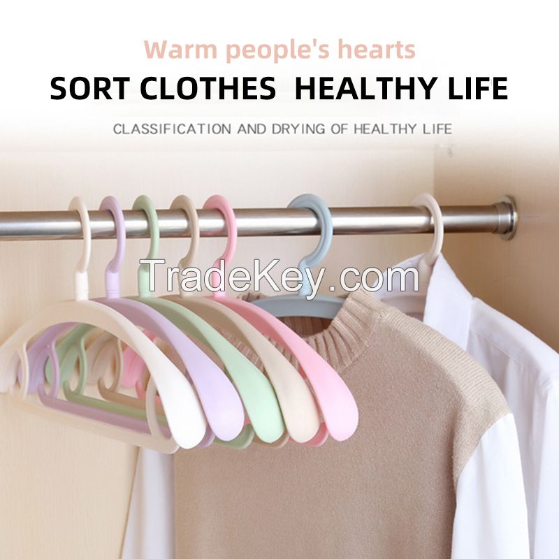 Wholesale thickened wide shoulder hanger no trace non-slip plastic clothes hanger 360 degree clothes support clothing dry cleaners hanger