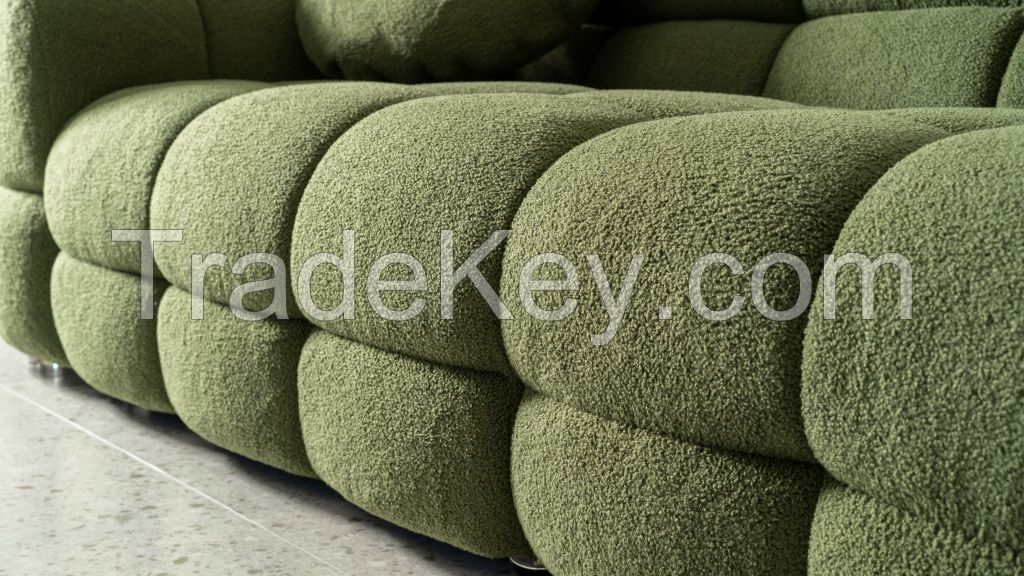 Green croutons in a row sofa