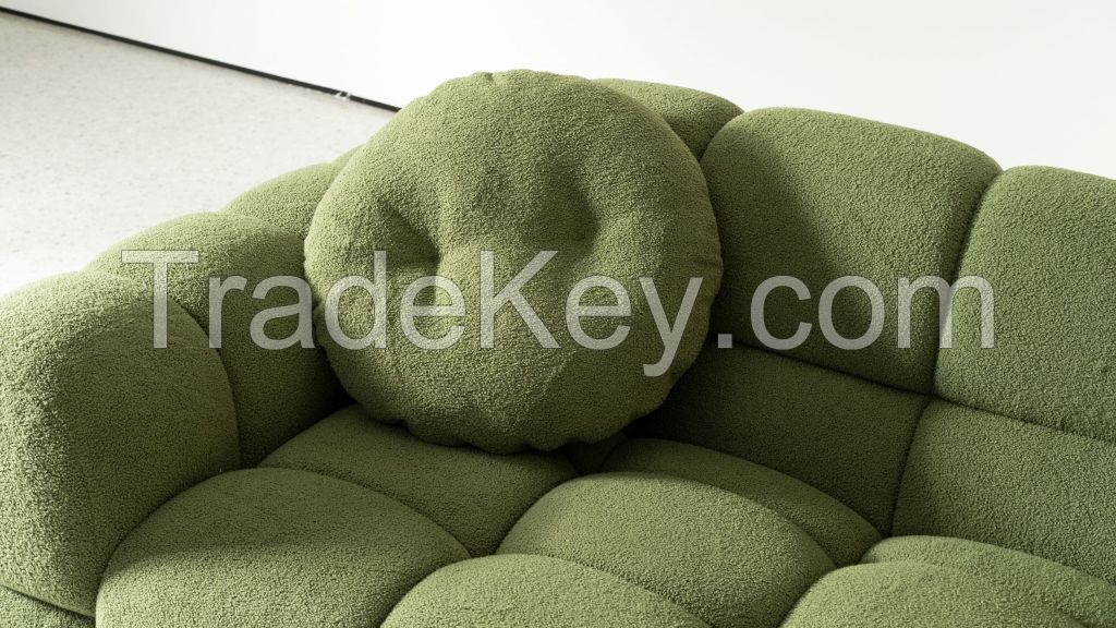 Green croutons in a row sofa