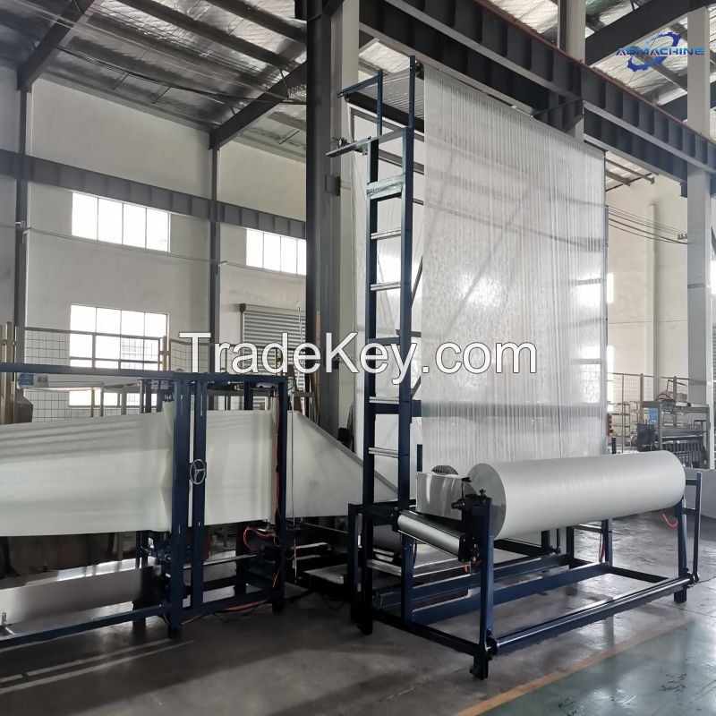 Nonwoven mulch folding machine