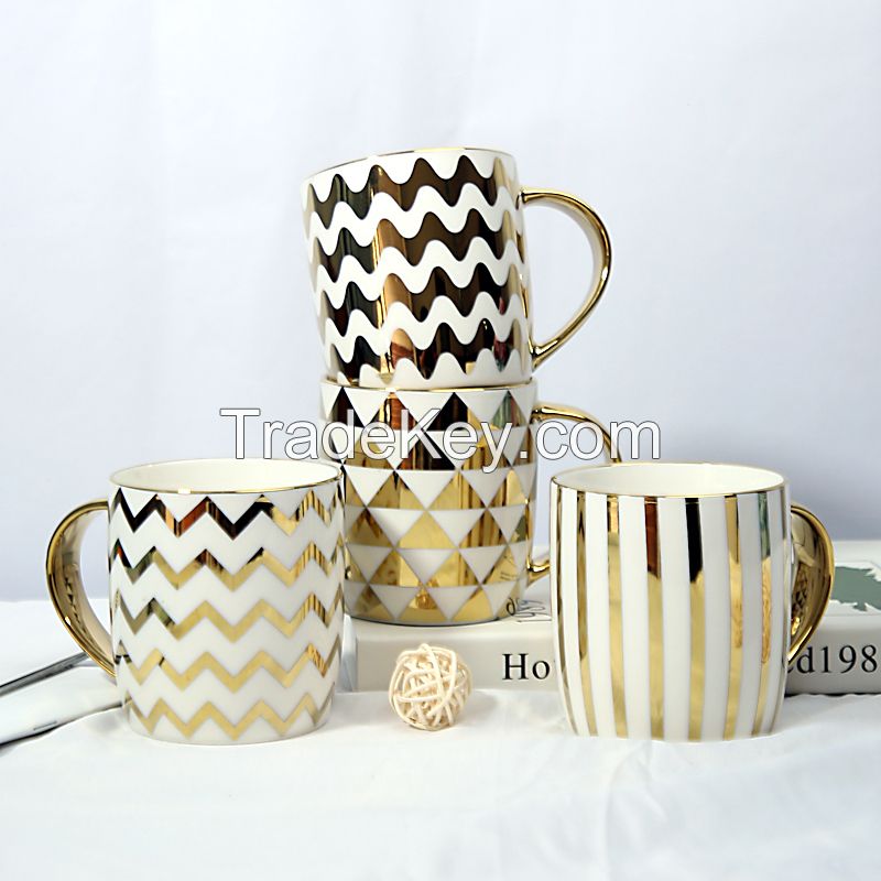 Gold Handle Coffee Mug with Geometric Design