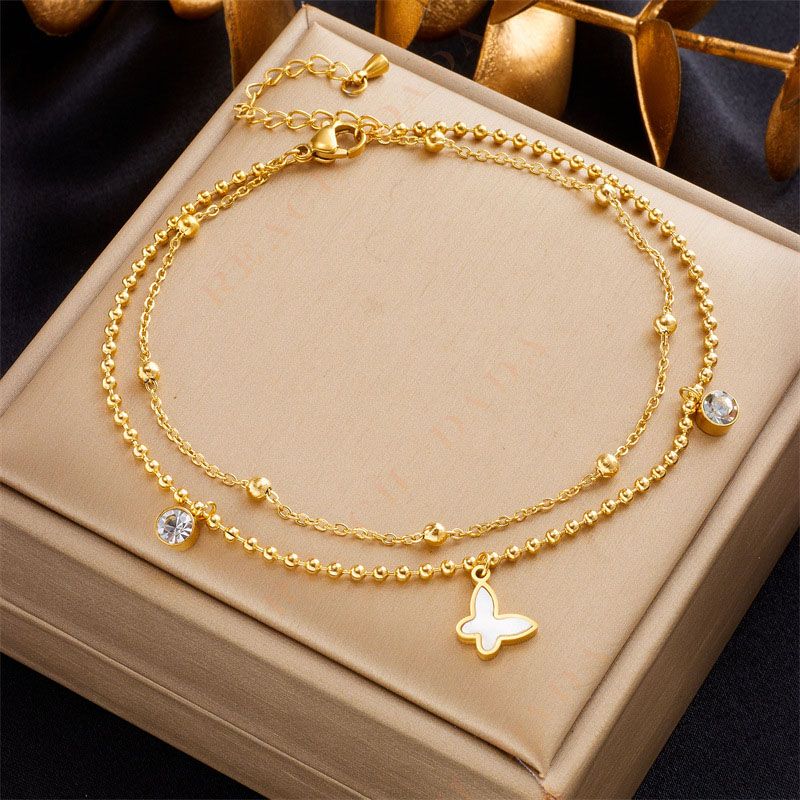 DaDa Fashionable simple high-end temperament, retro multi-layered beaded chain, diamond-encrusted butterfly pendant, titanium steel anklet