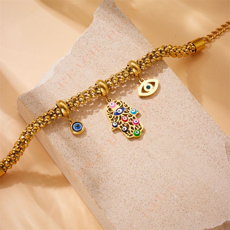 DaDa Fashion Europe America personality vintage, high-grade gold-plated stainless steel, dripping oil, Fatima hand, eye pendant jewelry bracelet