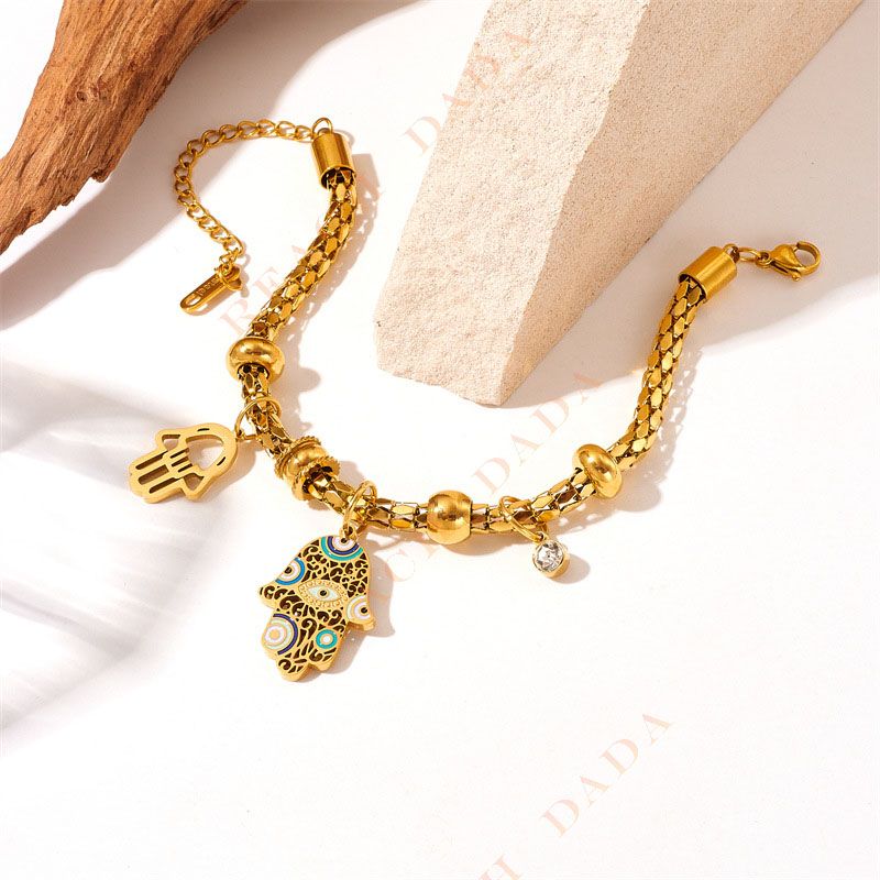 DaDa Fashionable retro design gold-plated titanium metal drip pattern palm pendant cylindrical chain bracelet