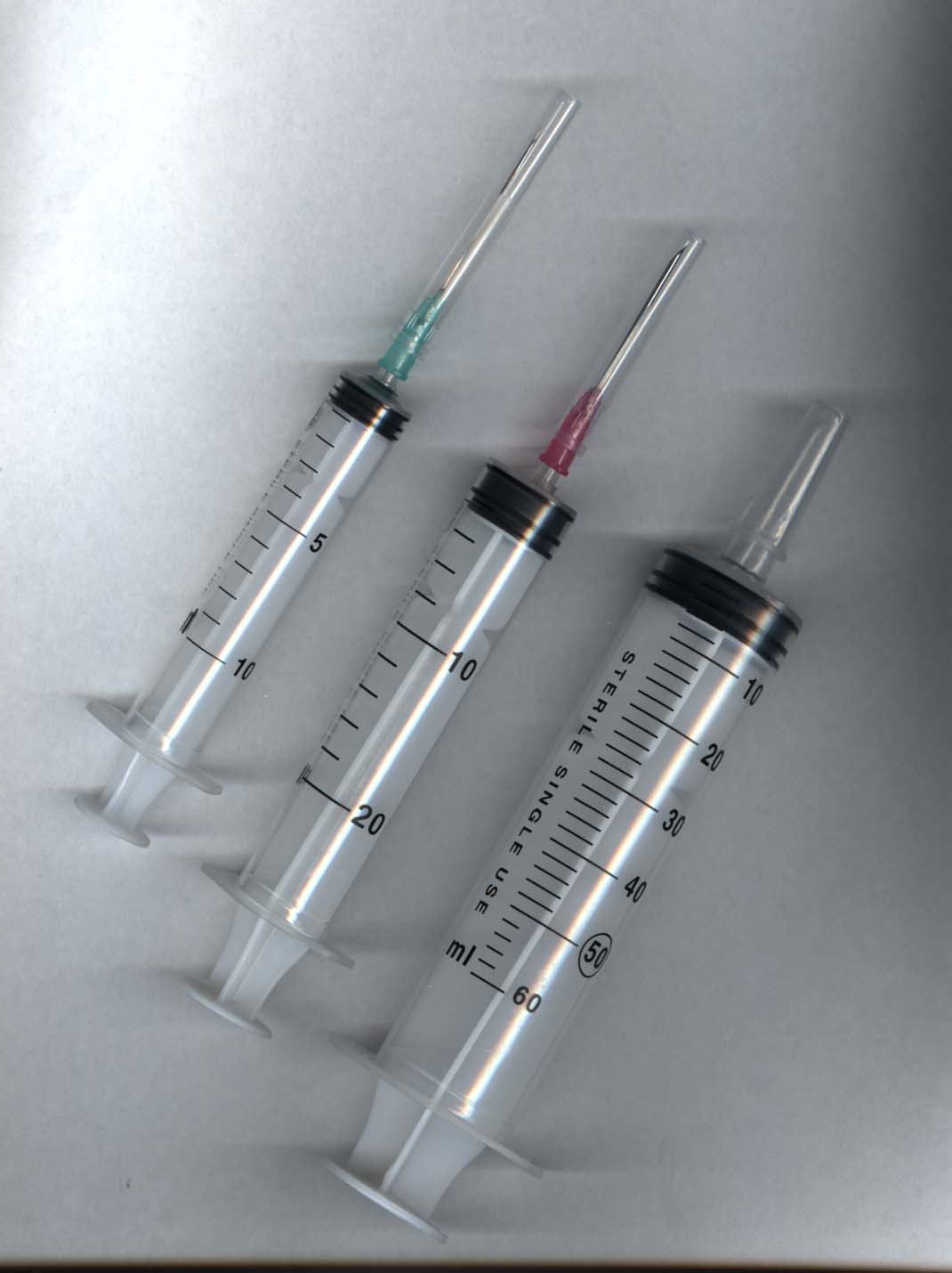 Disposable syringes