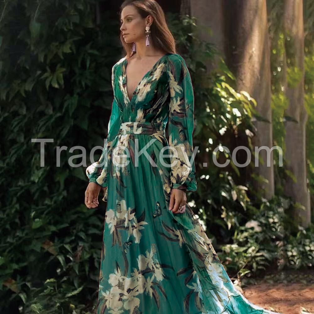 New women's dress with a V-neck, long sleeves, printed pattern and a flared skirt.