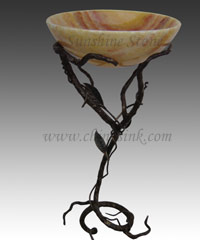 Stone sink--Lunar-stand-with-ruby-onyx-vessel-sink.jpg