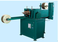 Cutting machine for metallic strip