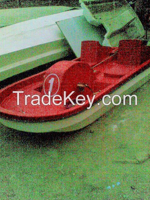 Fiberglass paddle boat