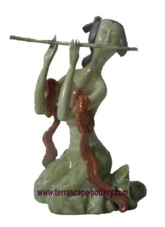 Handmade pottery statues, figures , performing girl