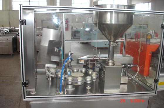 Ultrasonic plastic filling and sealing mmachine