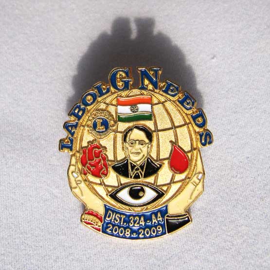 round metal badge